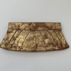 Metallic gold distressed leather clutch